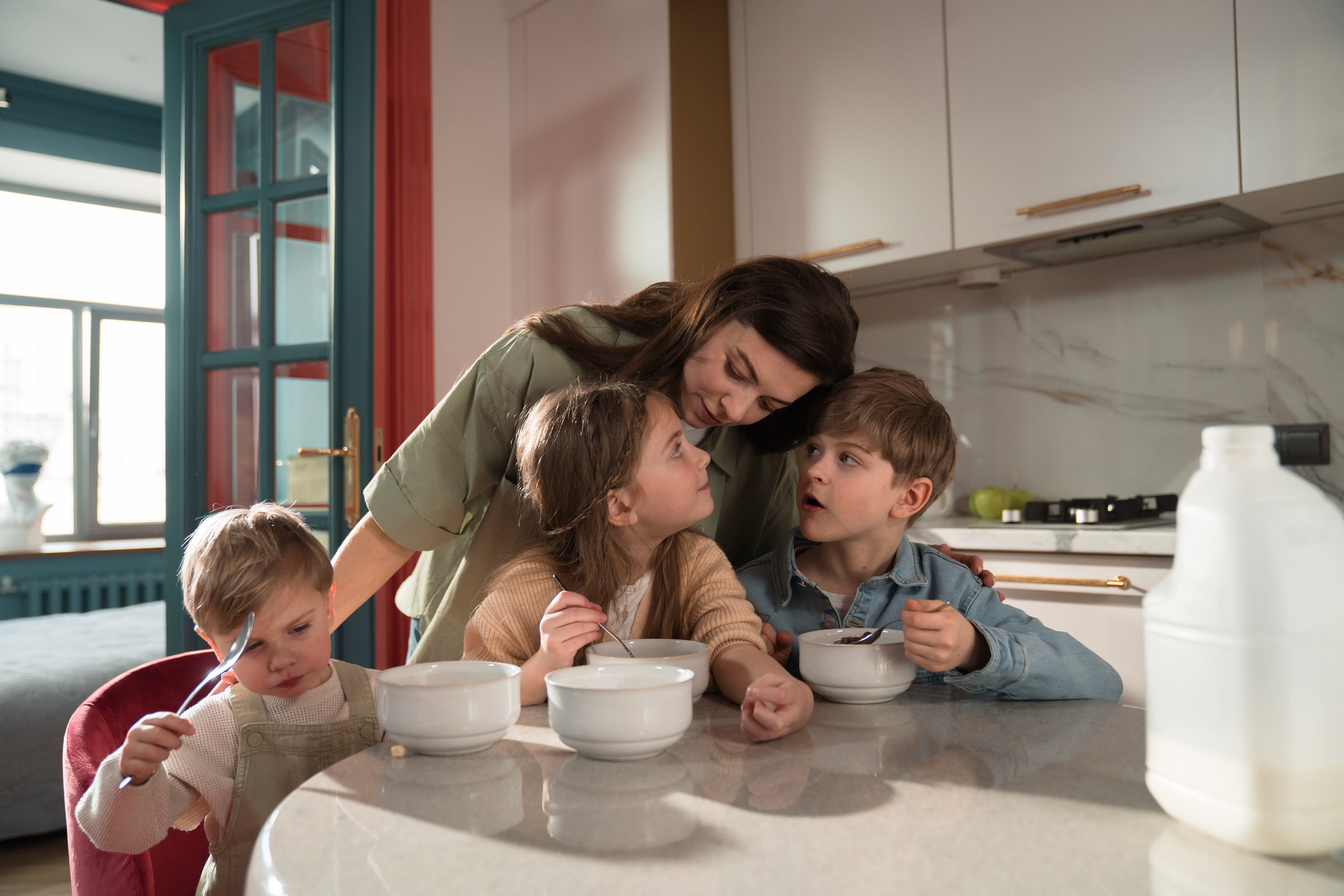 Mother with his Children Eating 